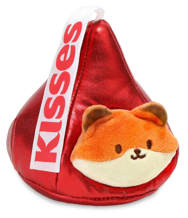 Plush toy shaped like a red Hershey's Kisses candy with a fox face on a white background