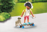 Skateboarder with Dog